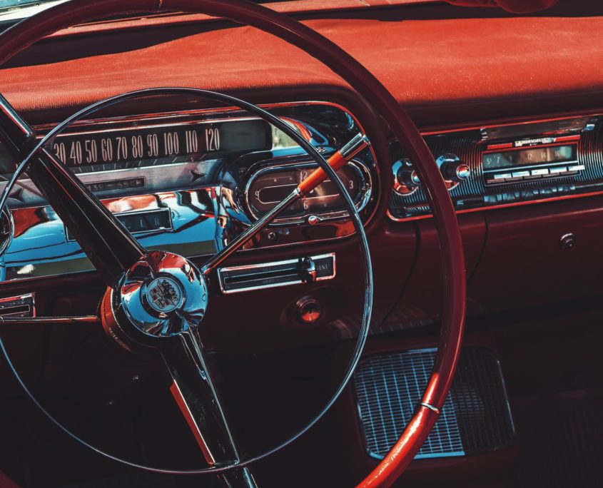 classic car dashboard showing a vintage speedometer repair